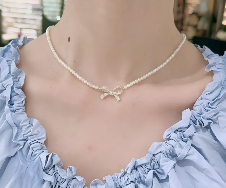 PQT-992 - Bow Shape Pearl Pendant Necklace for Women – Dainty Jewelry with Sparkling Bow Design | Available in Silver & Golden Finish | Perfect Gift for Weddings, Parties & Everyday Glamour - Golden